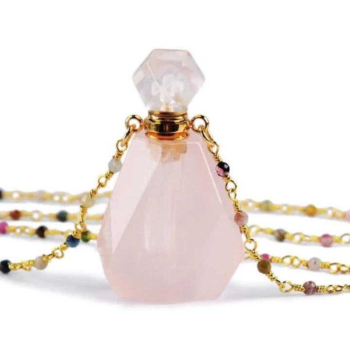 Collier bouteille de parfum en cristal