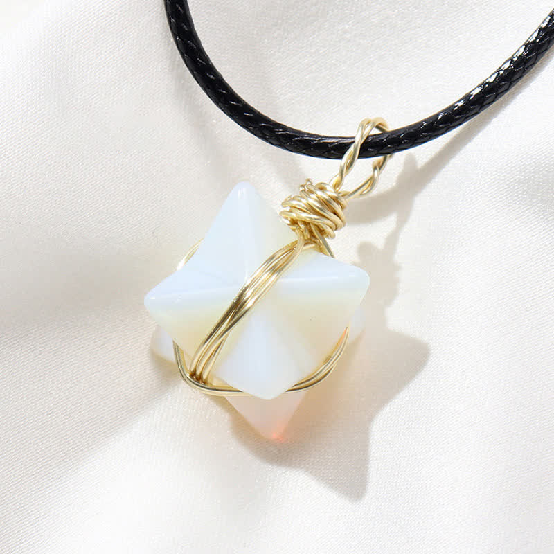 VÉHICULE DE LUMIÈRE DIVINE - Collier Merkaba en cristal