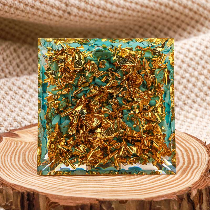 Bouddha Olivenorma avec pyramide orgone d'équilibre turquoise naturelle