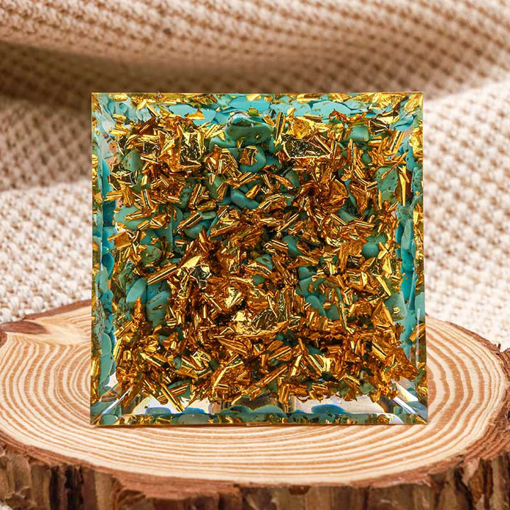 Bouddha Olivenorma avec pyramide orgone d'équilibre turquoise naturelle