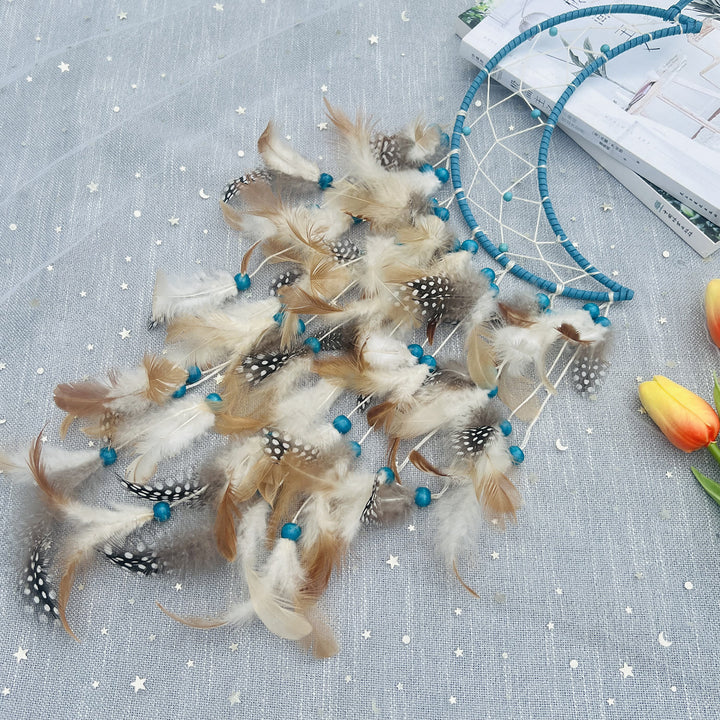 Attrape-rêves en forme de lune, d'étoiles et de soleil turquoise Olivenorma