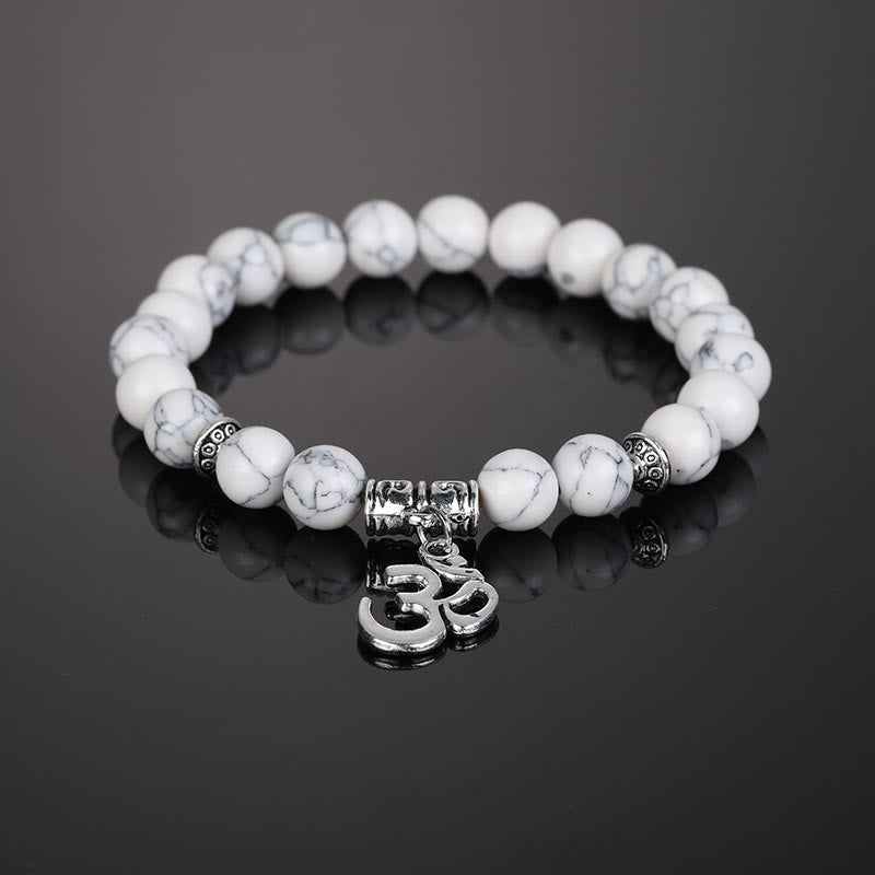 Bracelet symbole Om en perles de cristal naturel Olivenorma