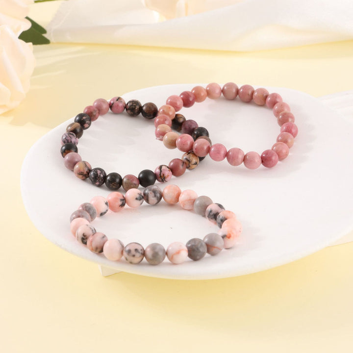 Bracelet de perles fait main en pierre zébrée rose rhodochrosite Olivenorma de 8 mm