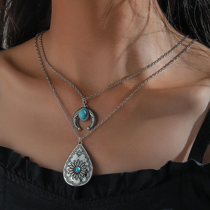 Collier pendentif double couche sculpté en forme de goutte turquoise Olivenorma