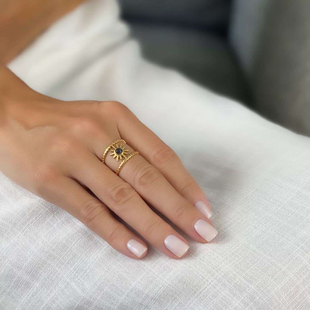 Bague Olivenorma en forme d'étoile à huit branches et à double rangée de tournesols