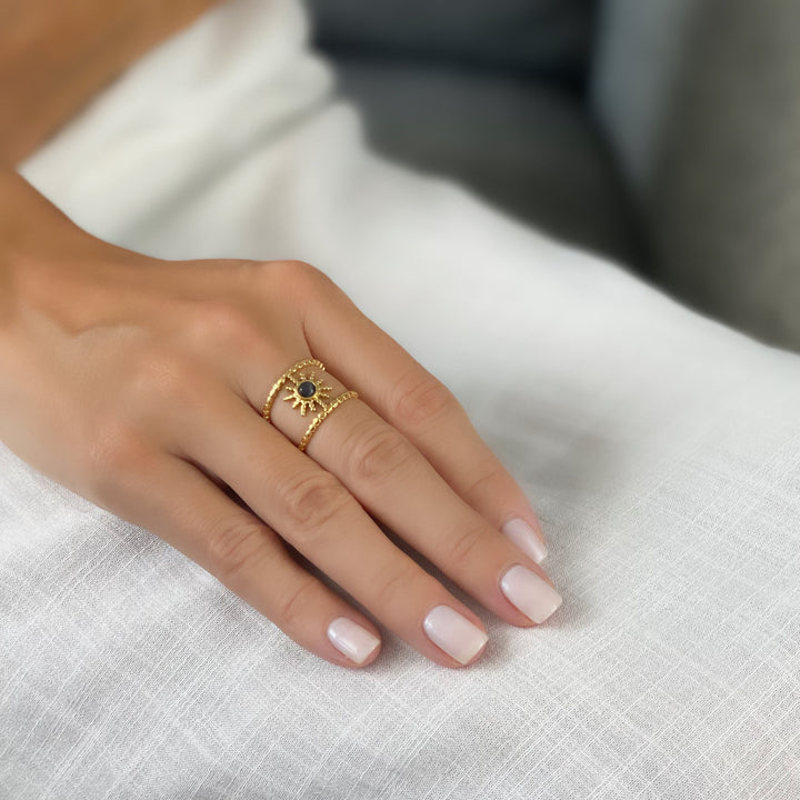 Bague Olivenorma en forme d'étoile à huit branches et à double rangée de tournesols