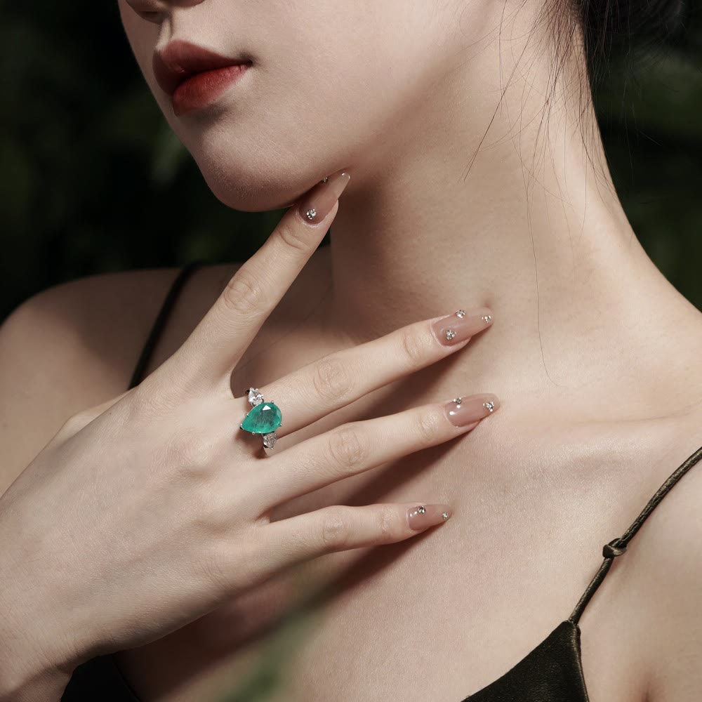 Bague exquise en zircon blanc et tourmaline Paraiba Olivenorma