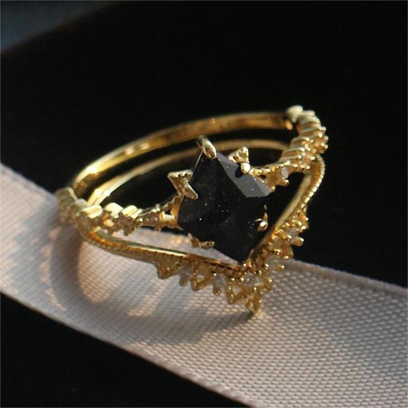 Bague couronne à double rangée de zircons blancs et de grès bleu Olivenorma