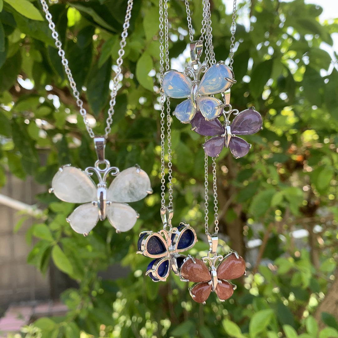 Collier papillon en cristal naturel Olivenorma