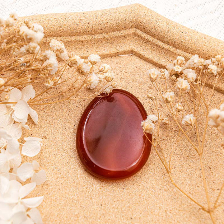 Pierre d'inquiétude pour le pouce en agate rouge Olivenorma
