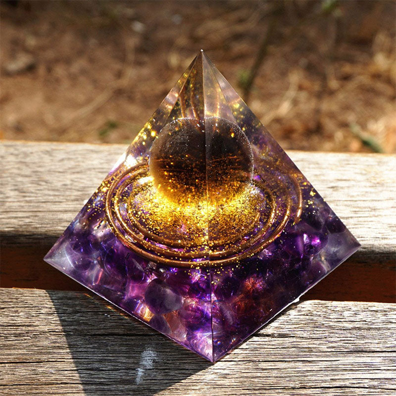 Boule de quartz fumé Olivenorma avec pyramide d'orgone en améthyste