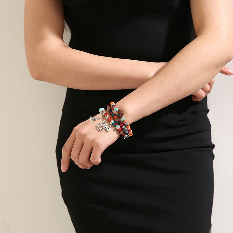 Ensemble de bracelets Hamsa contre le mauvais œil avec la tour de l'éléphant Olivenorma