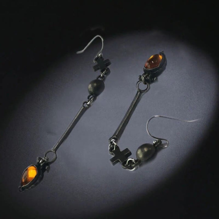 Boucles d'oreilles en pierre d'ambre en forme de goutte d'eau de la tribu Olivenorma