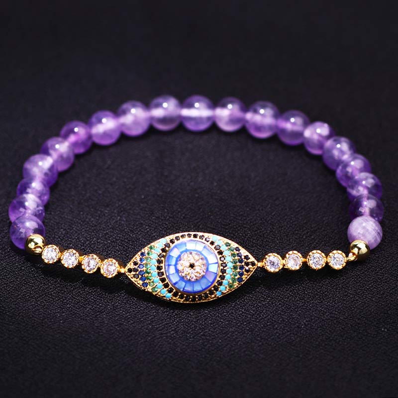 Bracelet de guérison Olivenorma avec symbole du mauvais œil en améthyste