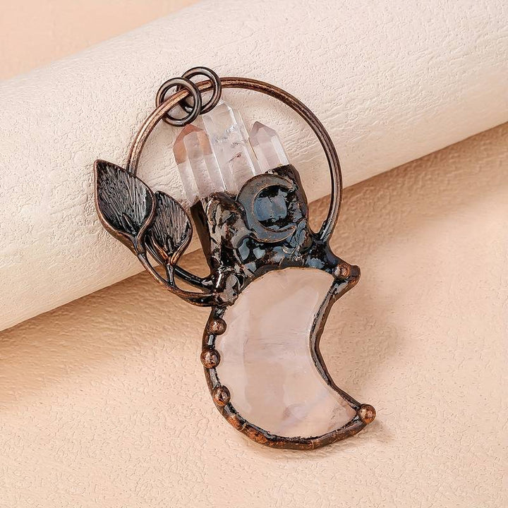Collier avec pendentif en cristal transparent en forme de lune et de plante en pierres précieuses Olivenorma