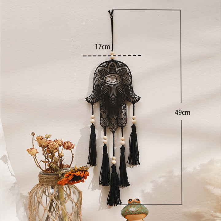 Décoration murale artisanale en bois avec pompon en forme de mauvais œil et Hamsa Olivenorma