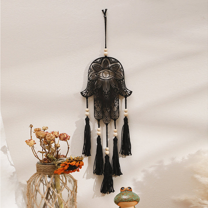 Décoration murale artisanale en bois avec pompon en forme de mauvais œil et Hamsa Olivenorma