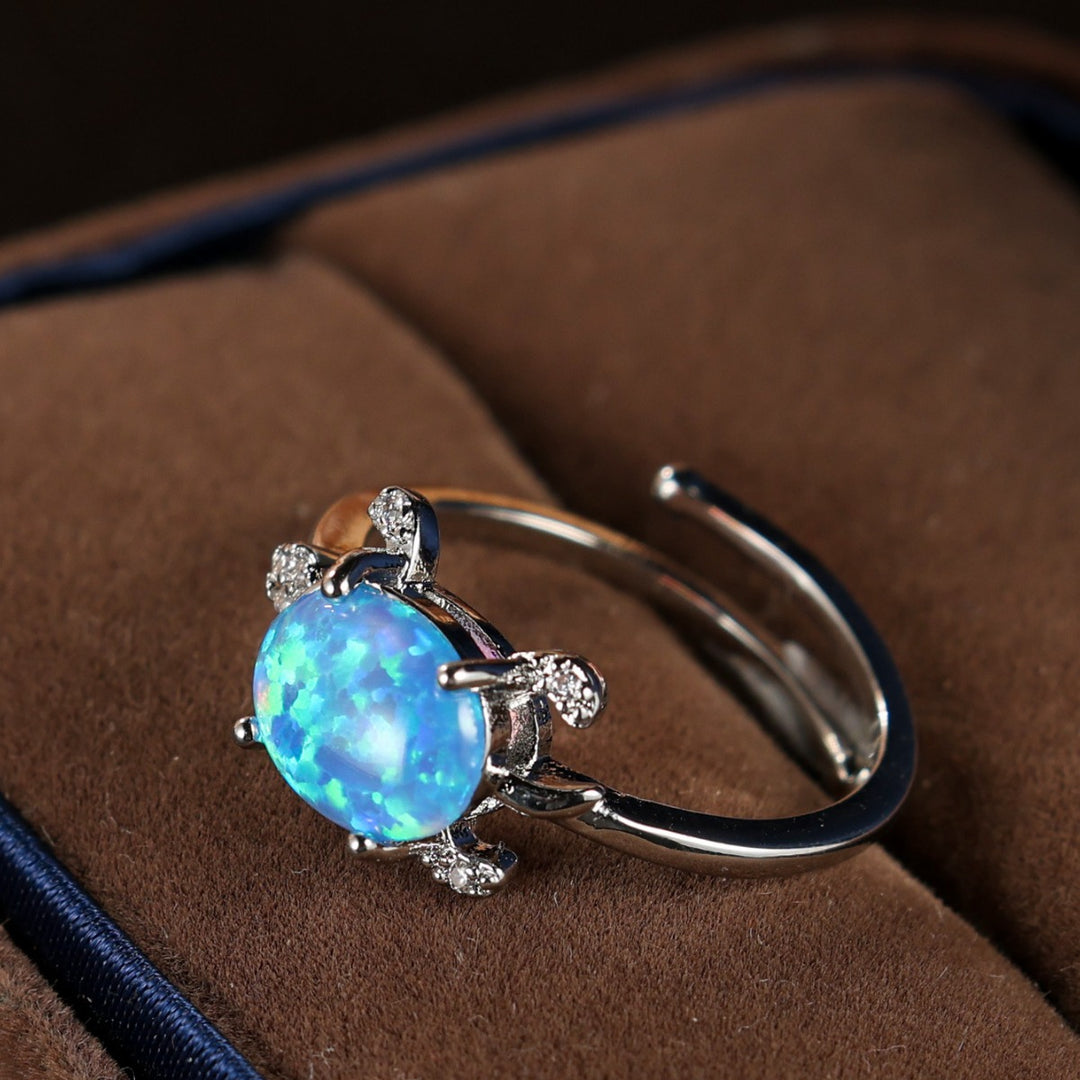 Bague Olivenorma en forme de tortue de mer mignonne avec opale bleue