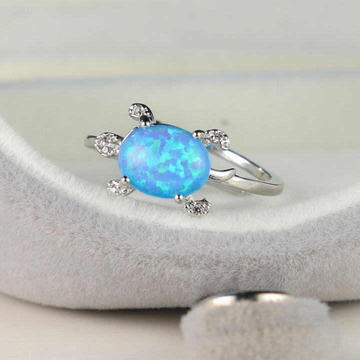 Bague Olivenorma en forme de tortue de mer mignonne avec opale bleue