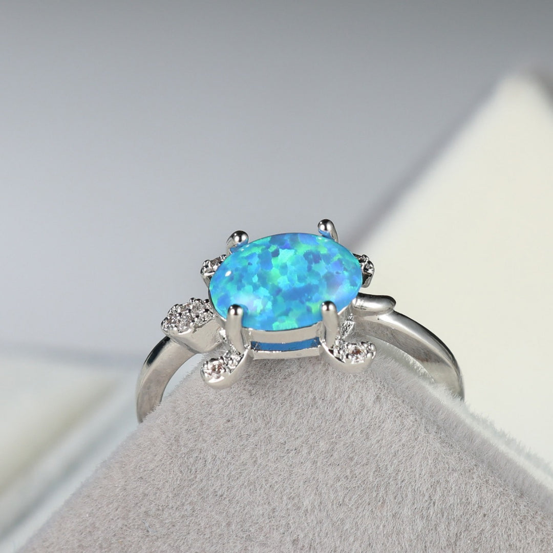 Bague Olivenorma en forme de tortue de mer mignonne avec opale bleue