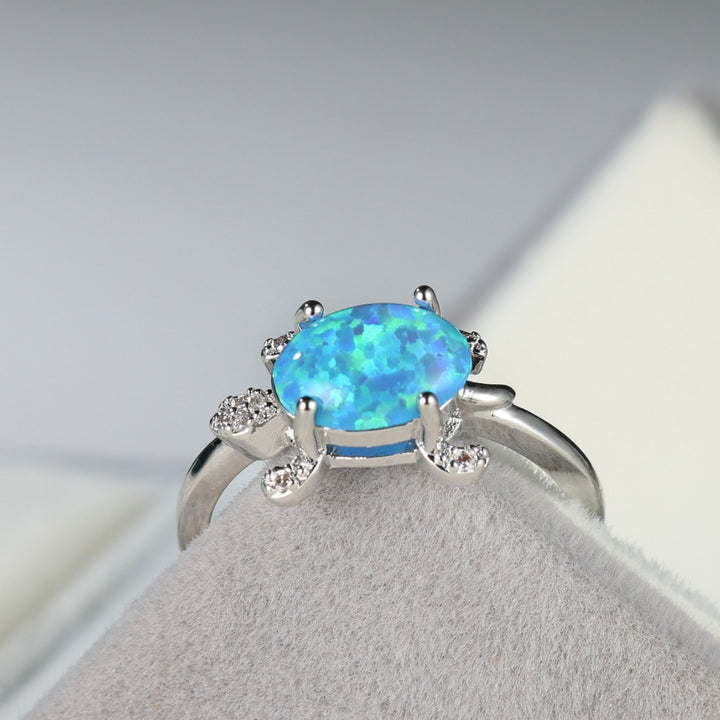 Bague Olivenorma en forme de tortue de mer mignonne avec opale bleue
