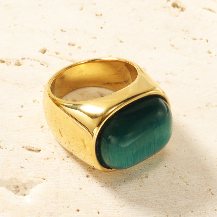 Bague en acier titane et turquoise avec pierre ovale œil de chat Olivenorma