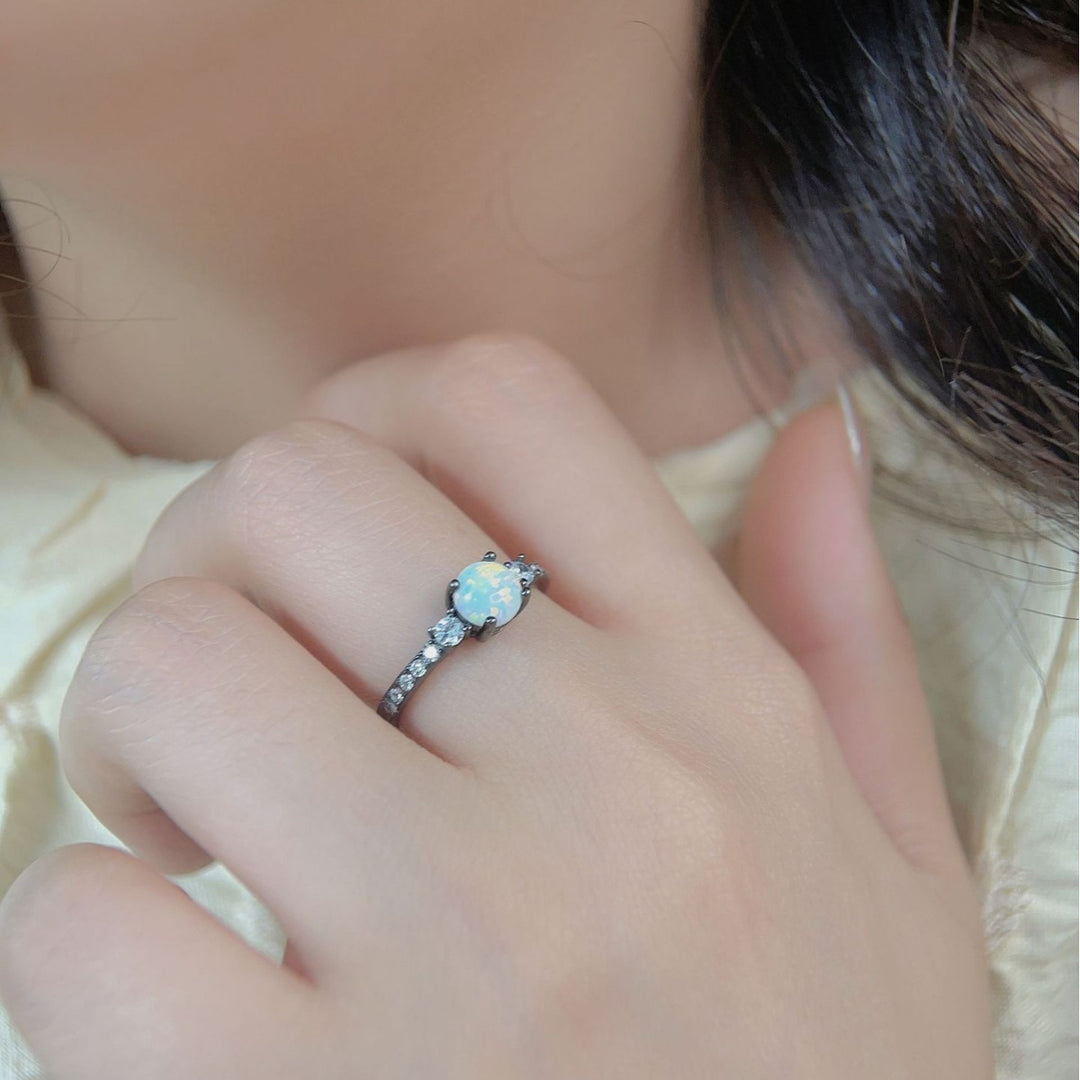 Bague Olivenorma en argent S925 plaqué or noir avec zircon blanc opale