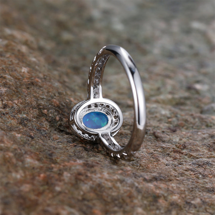 Bague Olivenorma à motif de corde tressée avec bordure en opale ovale