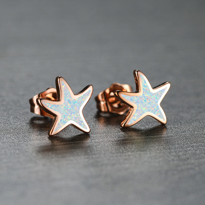 Boucles d'oreilles étoile de mer en opale bleue Olivenorma