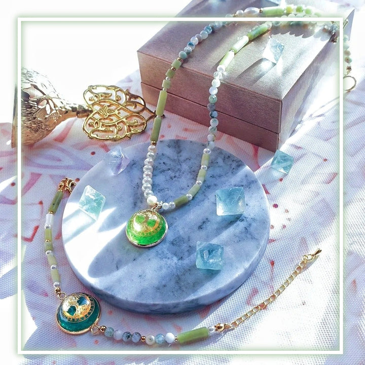 Ensemble de bijoux avec collier et bracelet en perles péridot et arbre de vie Olivenorma
