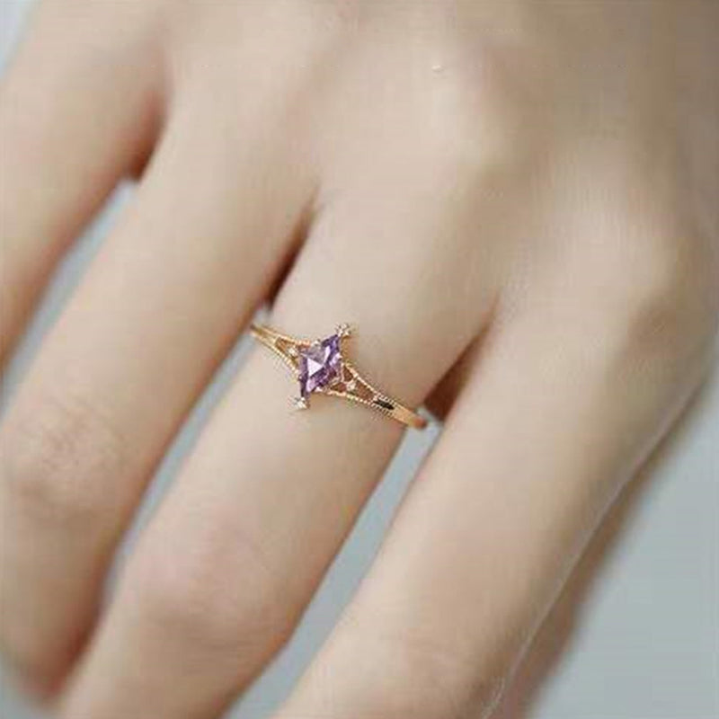 Bague de guérison en forme d'étoile avec topaze bleue et améthyste Olivenorma