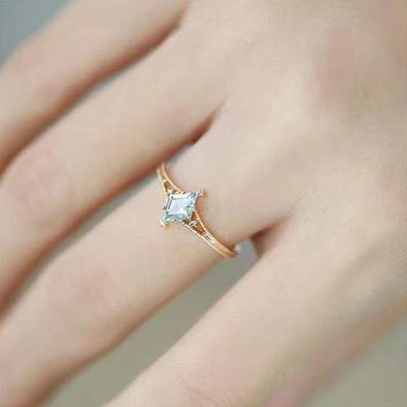 Bague de guérison en forme d'étoile avec topaze bleue et améthyste Olivenorma