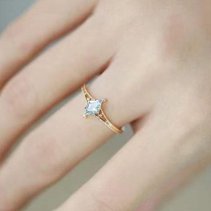 Bague de guérison en forme d'étoile avec topaze bleue et améthyste Olivenorma