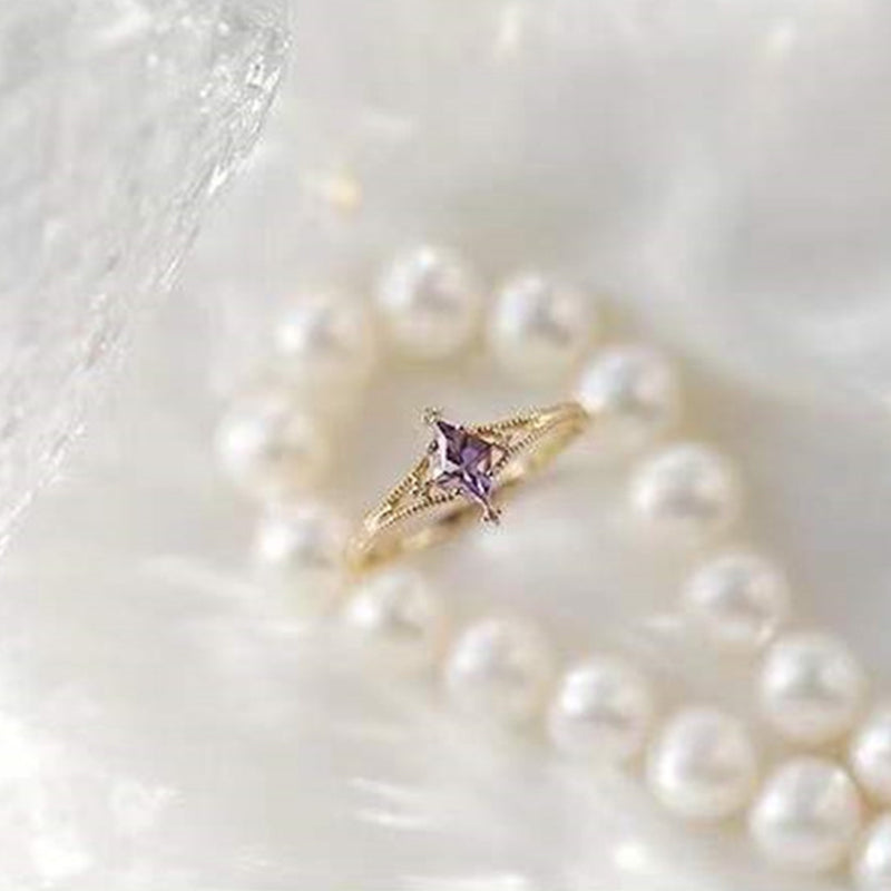 Bague de guérison en forme d'étoile avec topaze bleue et améthyste Olivenorma