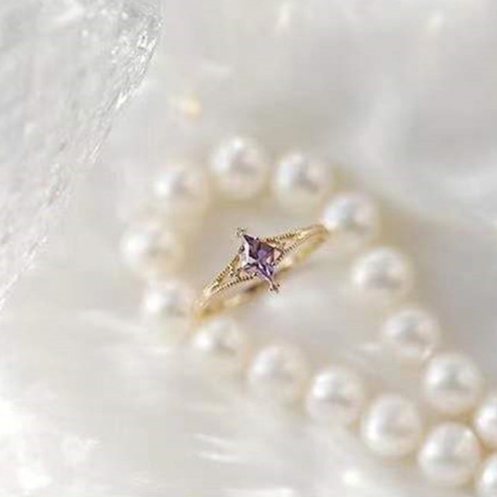 Bague de guérison en forme d'étoile avec topaze bleue et améthyste Olivenorma