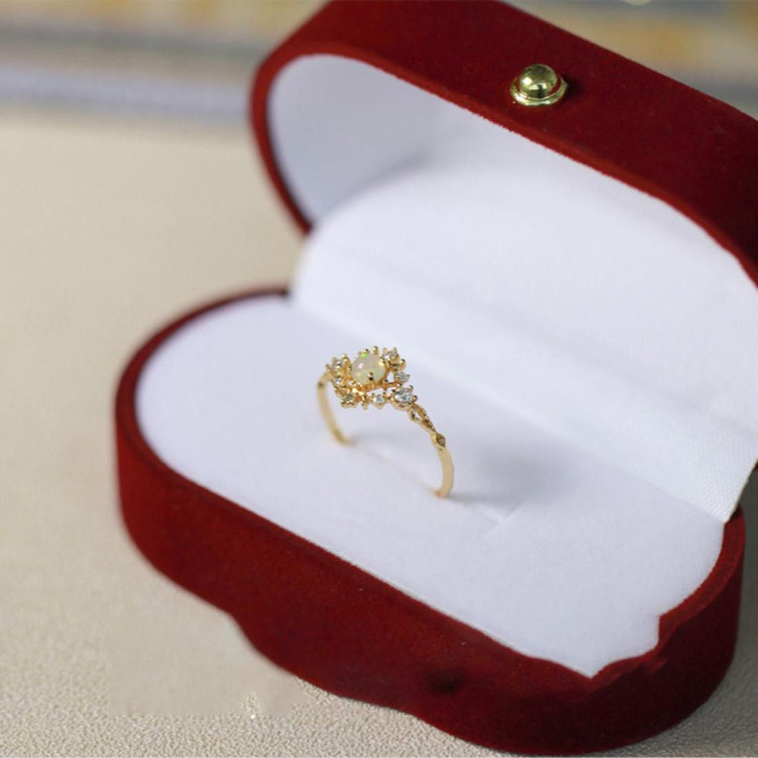 Bague de luxe légère en zircon blanc incrusté d'opale Olivenorma