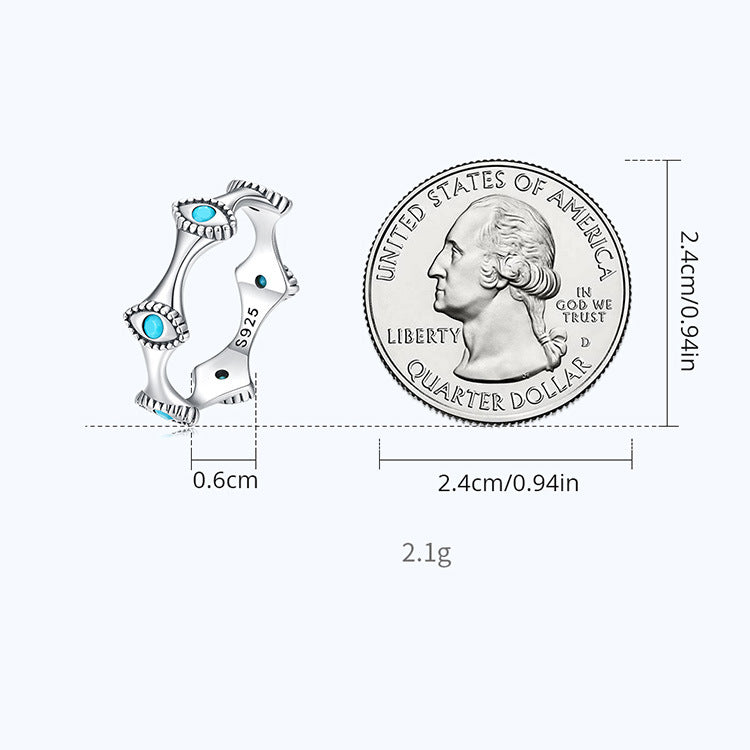 Boucles d'oreilles à tige en forme de croix solaire et mauvais œil turquoise Olivenorma