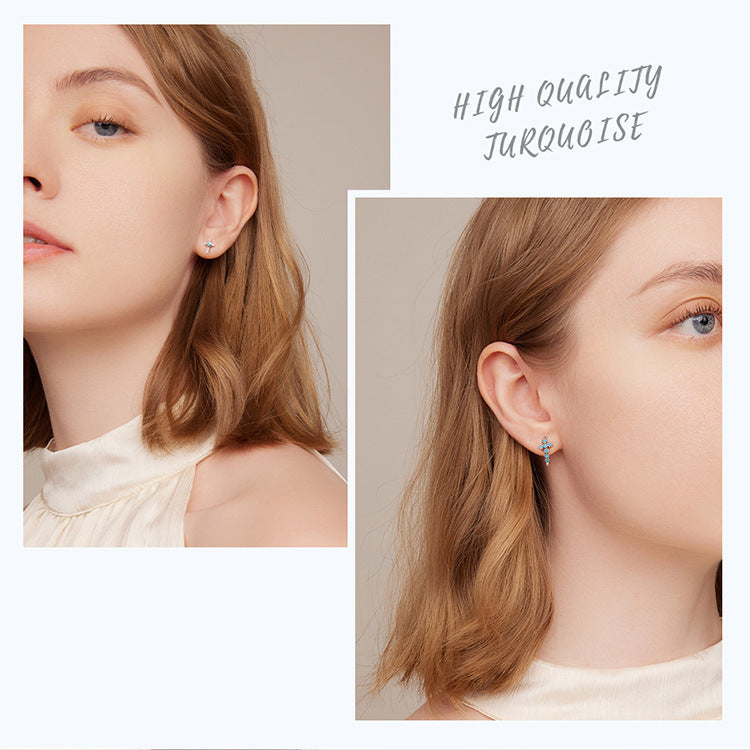 Boucles d'oreilles à tige en forme de croix solaire et mauvais œil turquoise Olivenorma