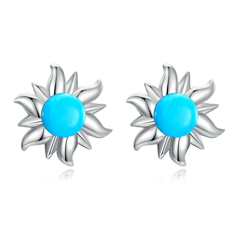 Boucles d'oreilles à tige en forme de croix solaire et mauvais œil turquoise Olivenorma