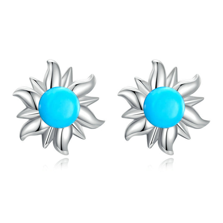 Boucles d'oreilles à tige en forme de croix solaire et mauvais œil turquoise Olivenorma