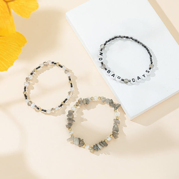 Ensemble de bracelets à trois rangs en perles de cristal Olivenorma « No Bad Days »