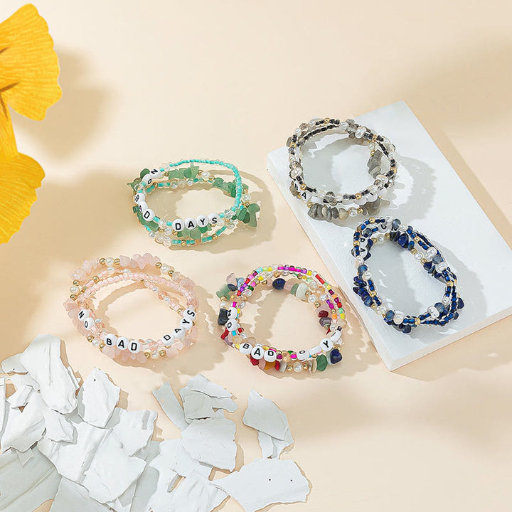 Ensemble de bracelets à trois rangs en perles de cristal Olivenorma « No Bad Days »