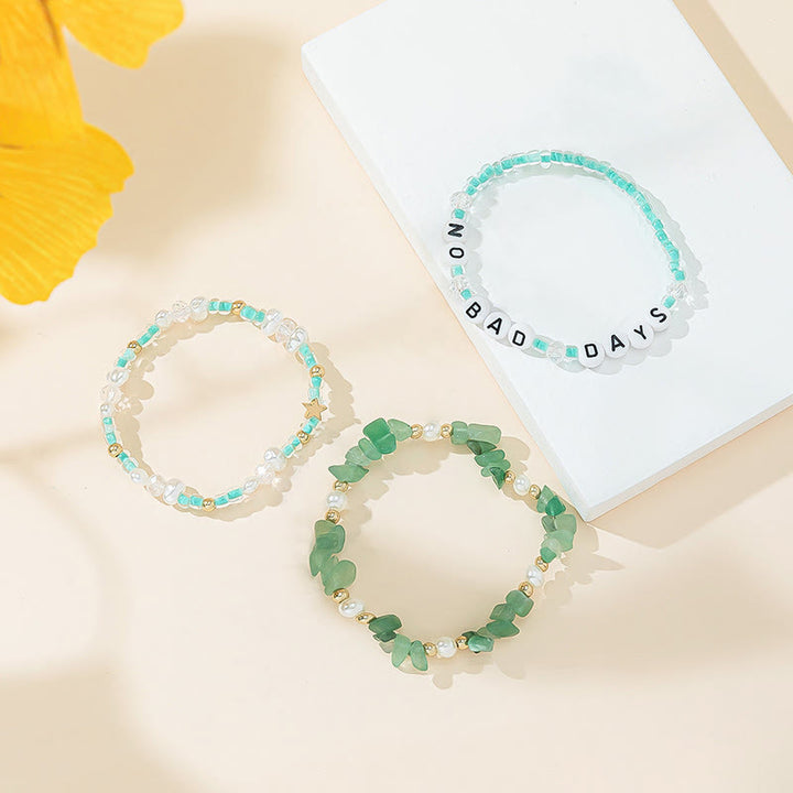 Ensemble de bracelets à trois rangs en perles de cristal Olivenorma « No Bad Days »