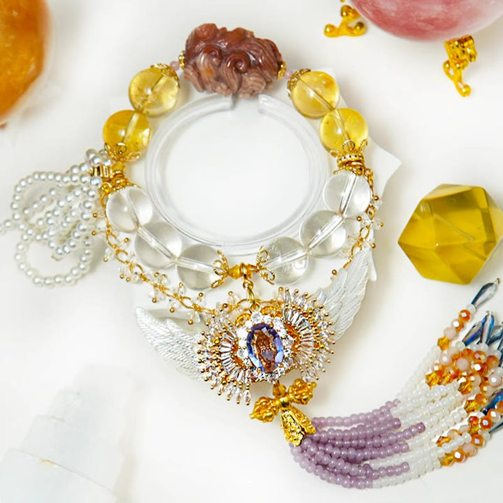 Bracelet à pampilles en cristal de citrine transparent « Ailes d'ange » Olivenorma