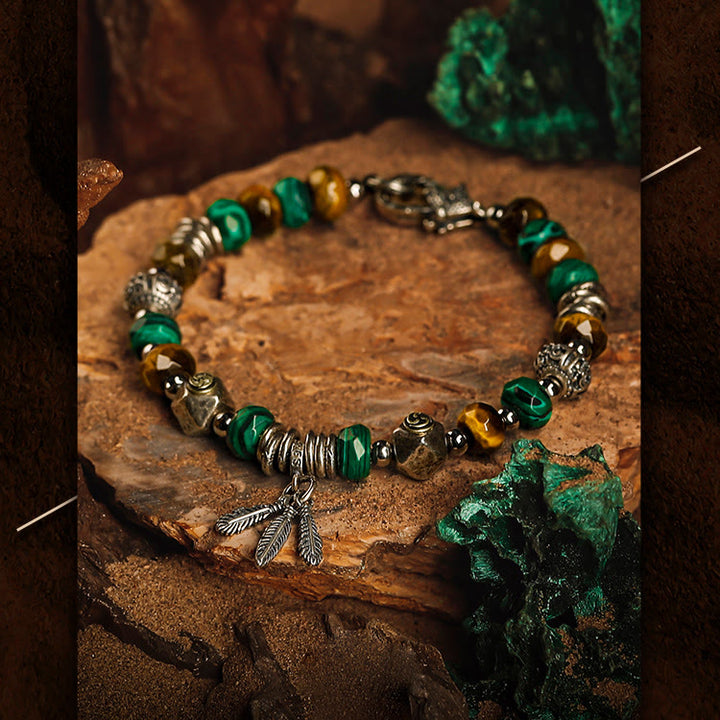 Bracelet Olivenorma pour homme avec pendentif en perles et plumes de malachite et œil de tigre