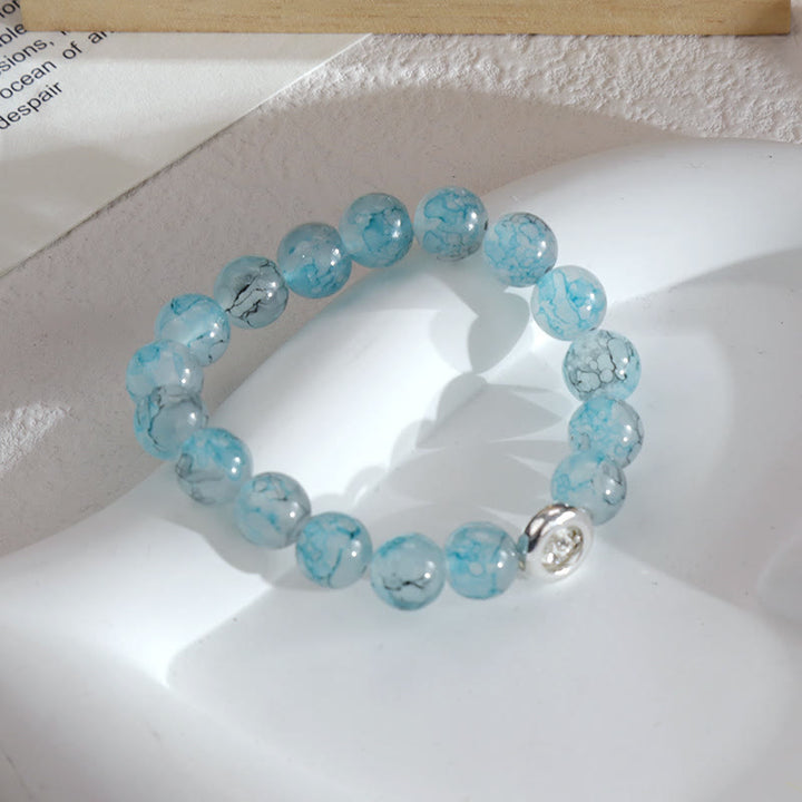 Bracelet en perles de cristal de verre bleu Olivenorma