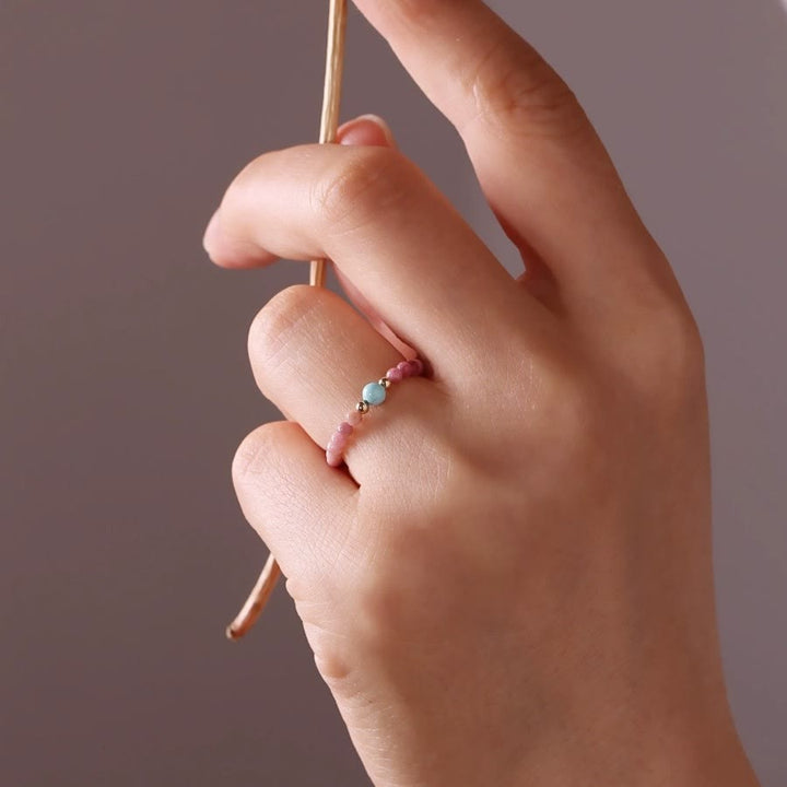 Bague Olivenorma en perles de rhodochrosite extra fines de 2 mm