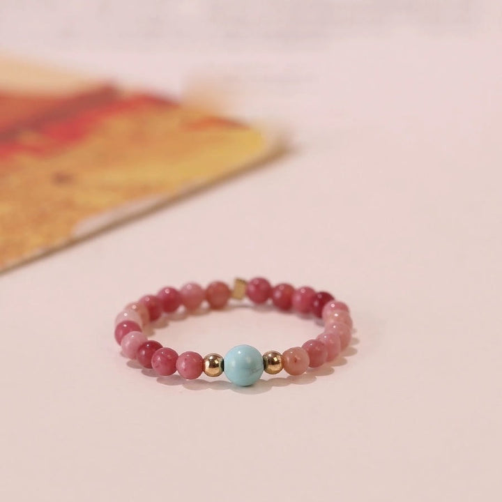 Bague Olivenorma en perles de rhodochrosite extra fines de 2 mm