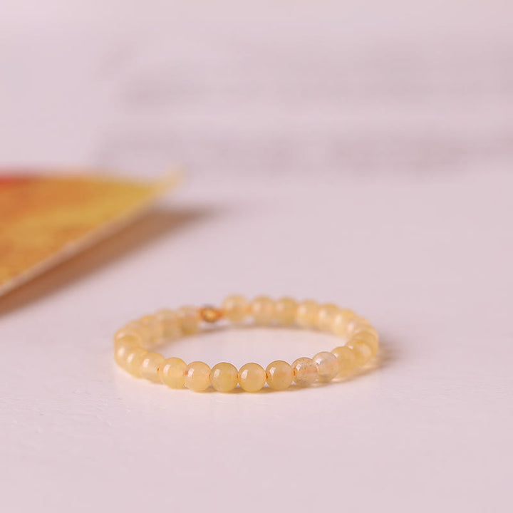 Bague en perles de jade jaune extra fines de 2 mm Olivenorma