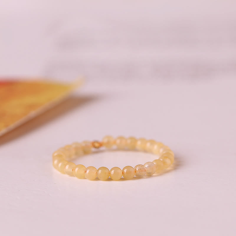 Bague en perles de jade jaune extra fines de 2 mm Olivenorma